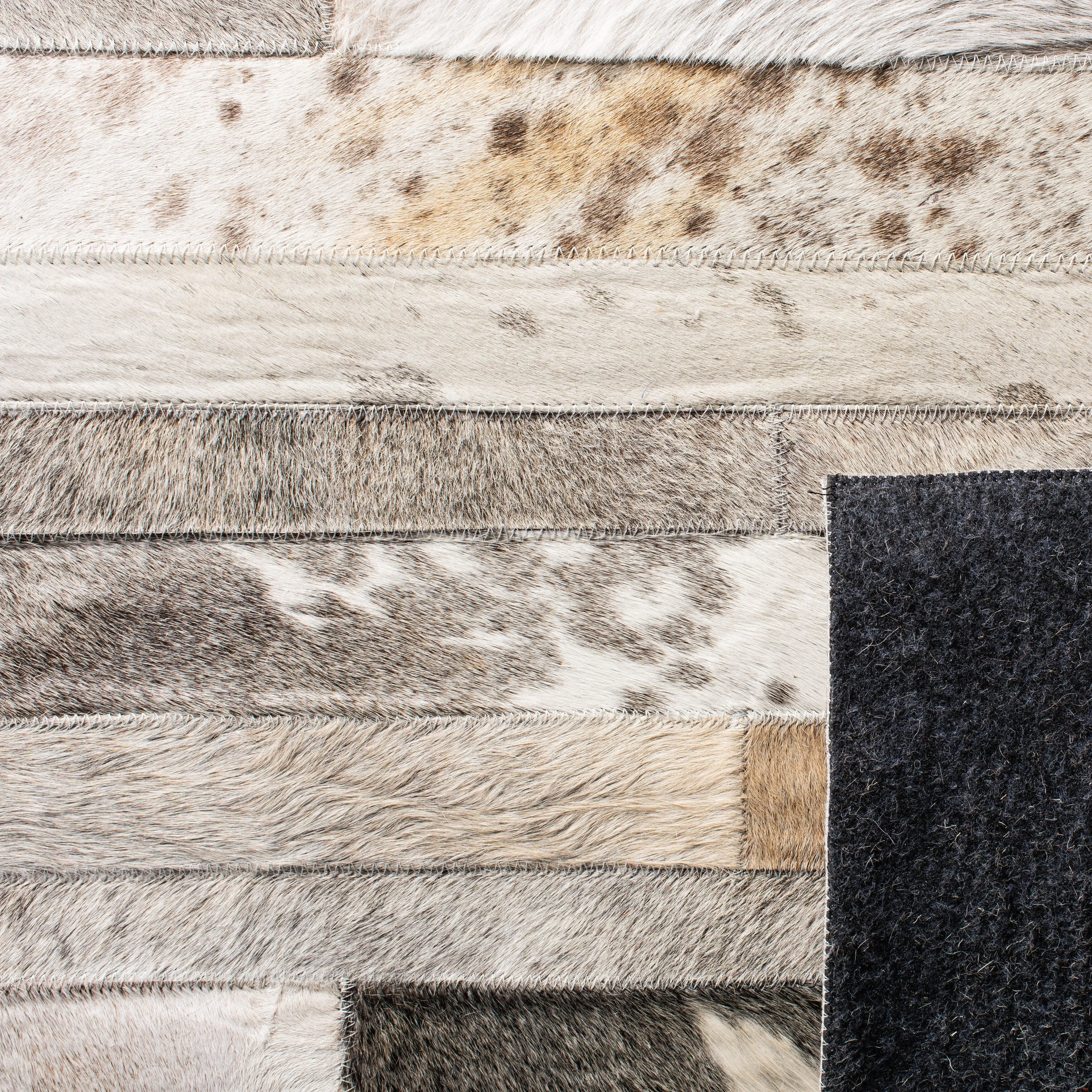 SAFAVIEH Handmade Studio Leather Tennille Modern Leather Rug