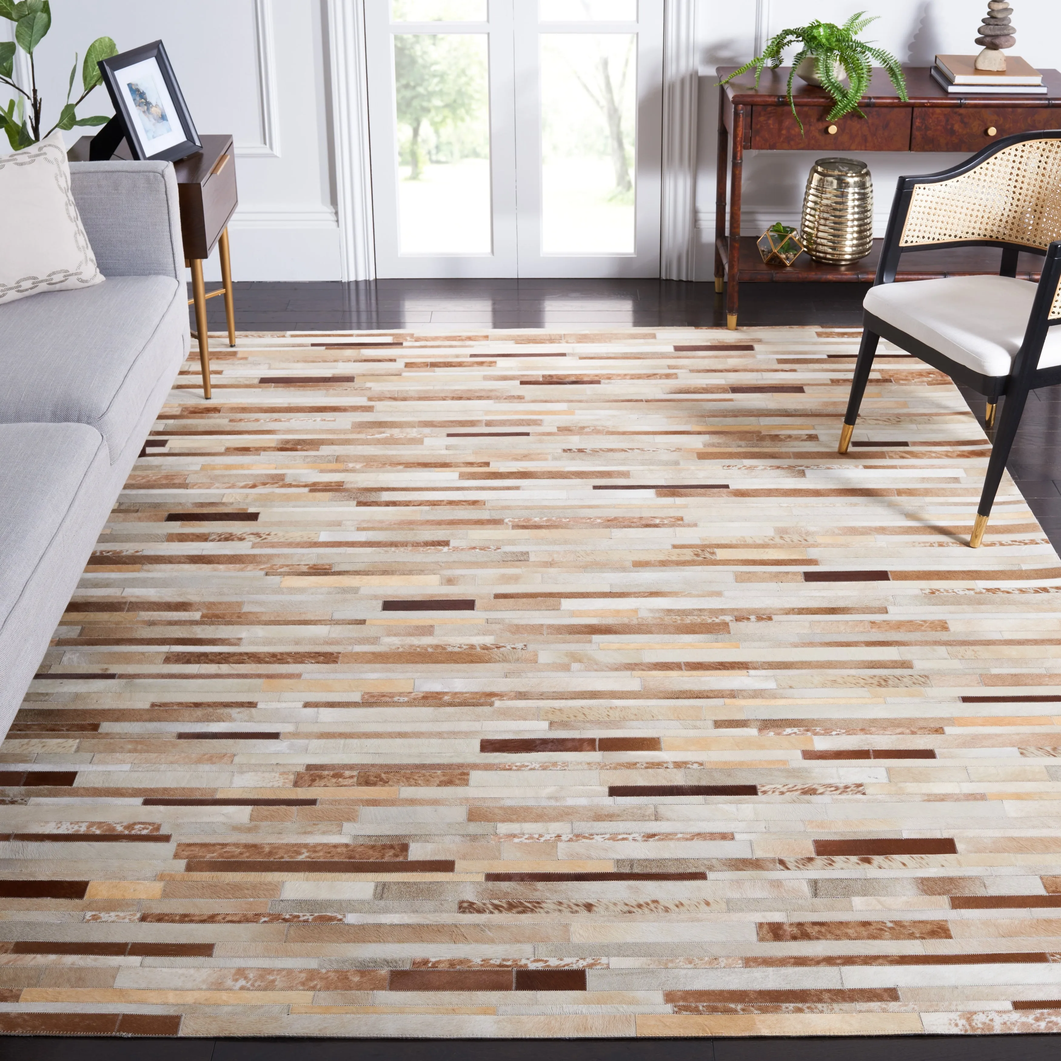 SAFAVIEH Handmade Studio Leather Tennille Modern Leather Rug