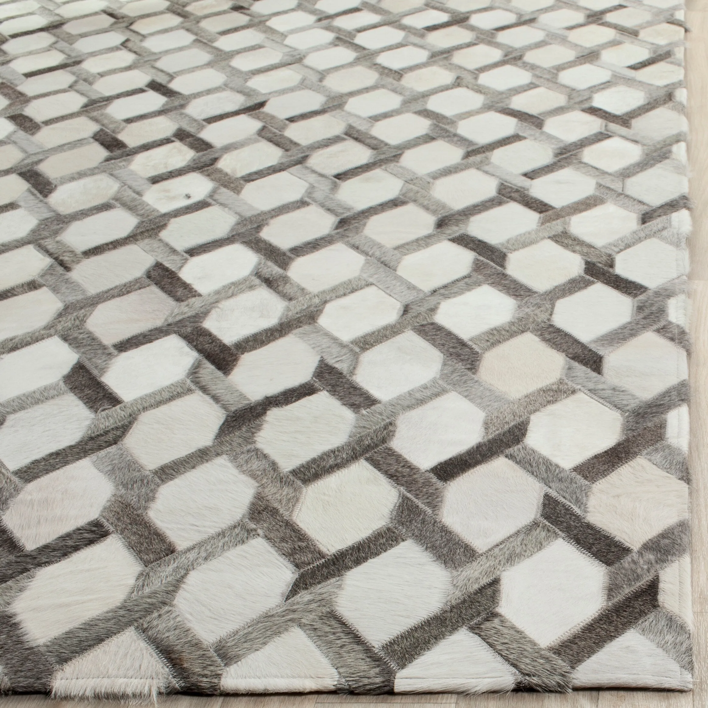 SAFAVIEH Handmade Studio Leather Tiana Modern Leather Rug
