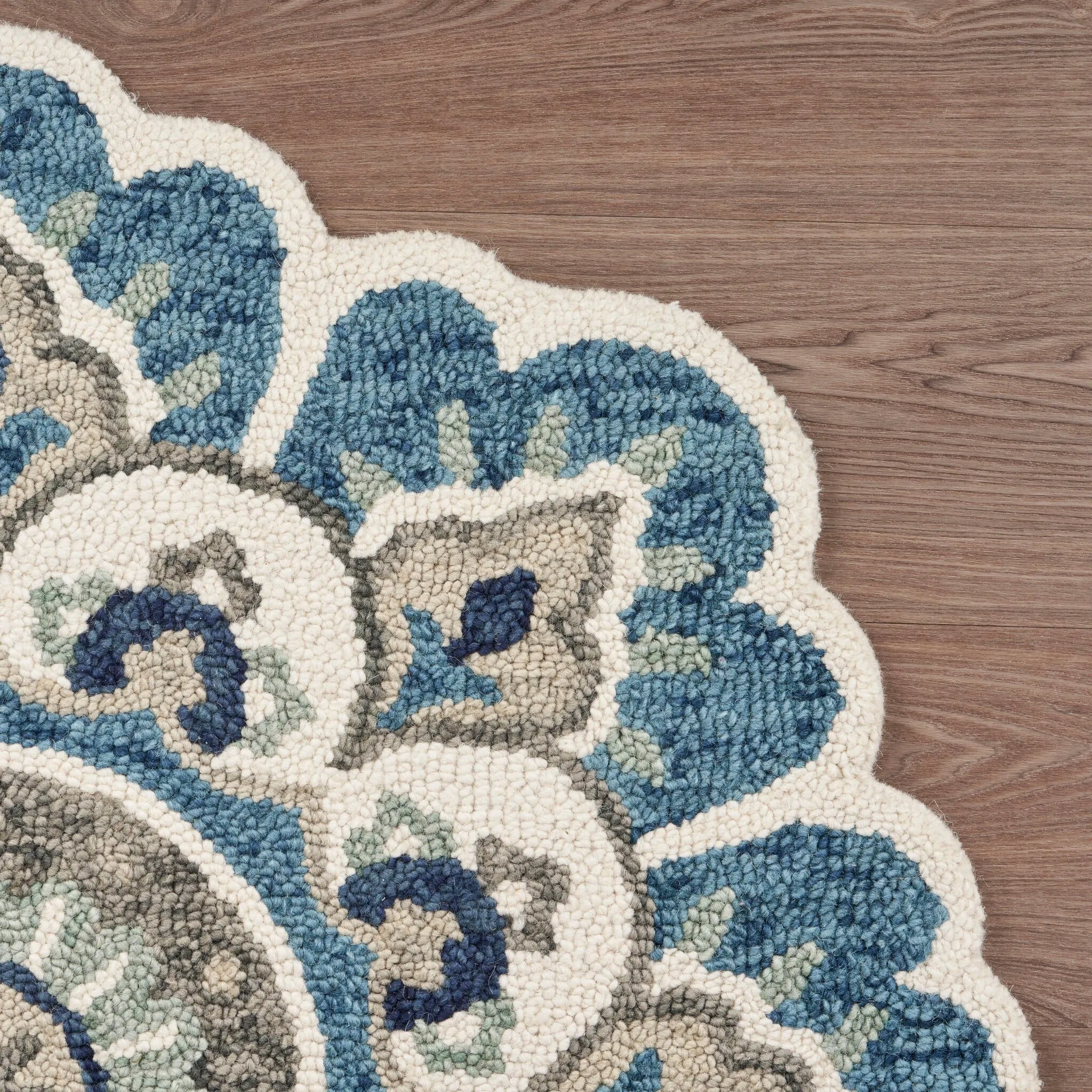 Sevita Hand Tufted Edged Floral Wool Rug