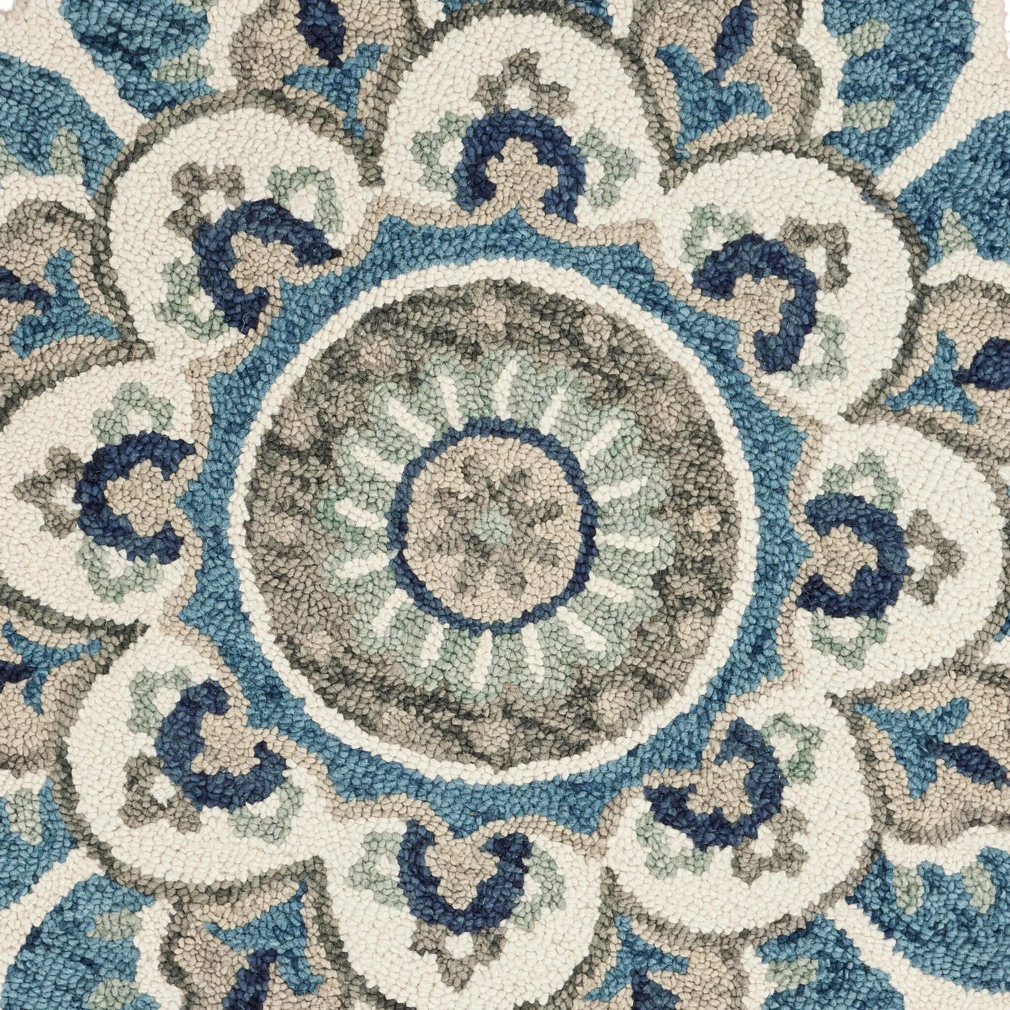 Sevita Hand Tufted Edged Floral Wool Rug