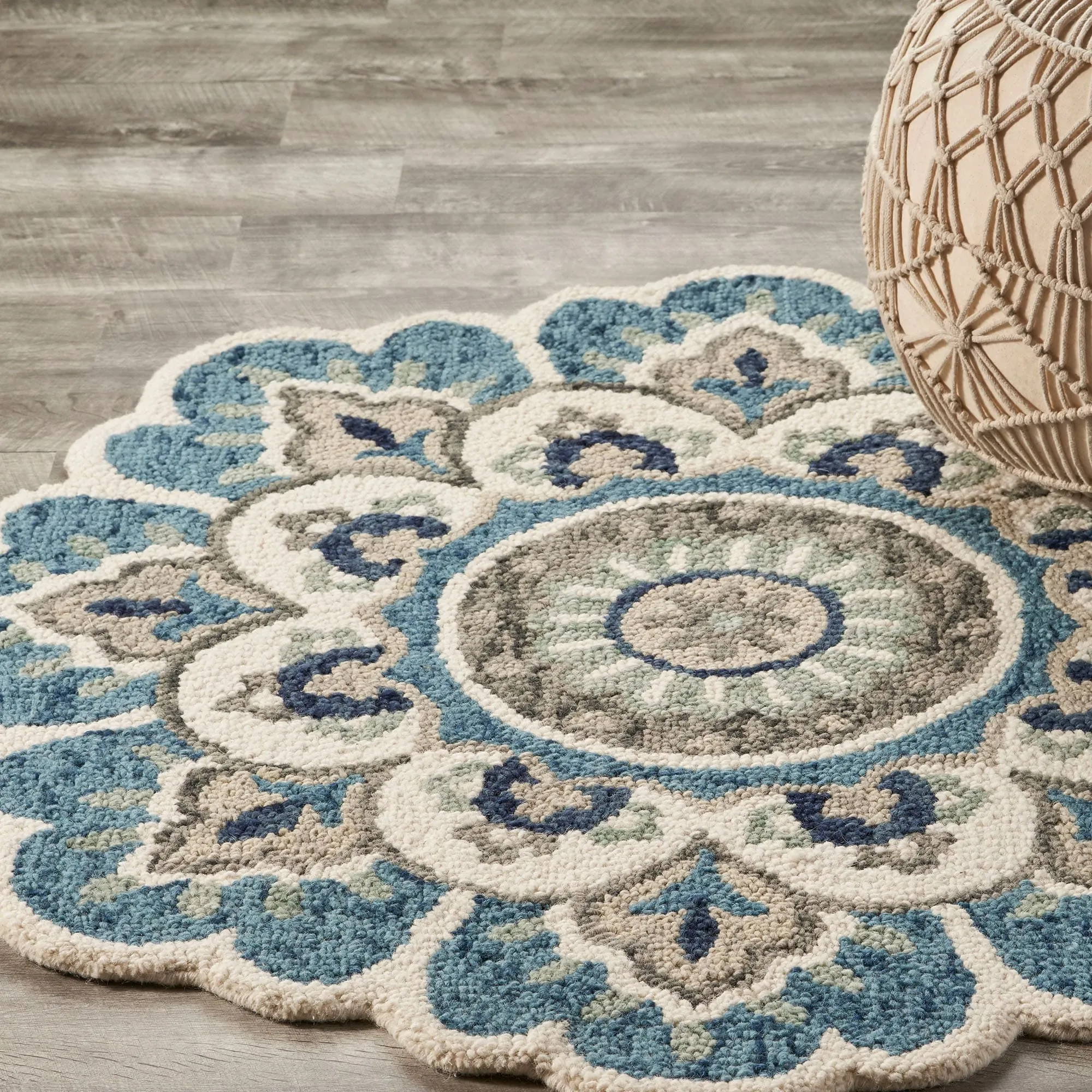 Sevita Hand Tufted Edged Floral Wool Rug